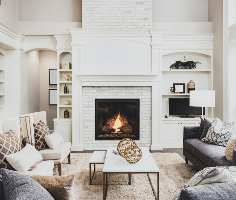 Interior white living room with brick fireplace