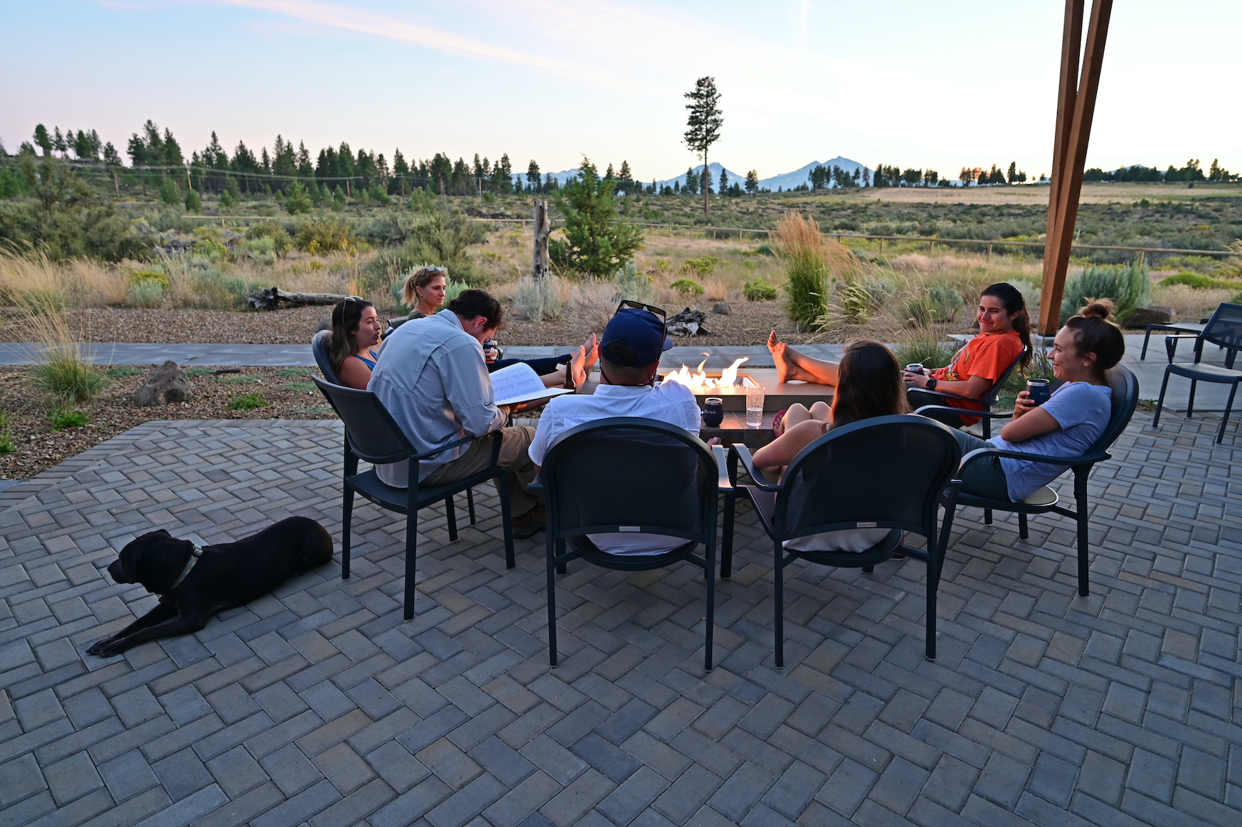 Six friends enjoy fire pit and view of Sisters, Oregon