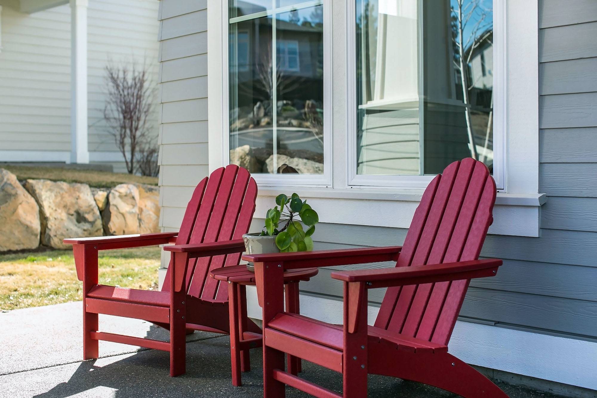 red adirondack chairs on front porch