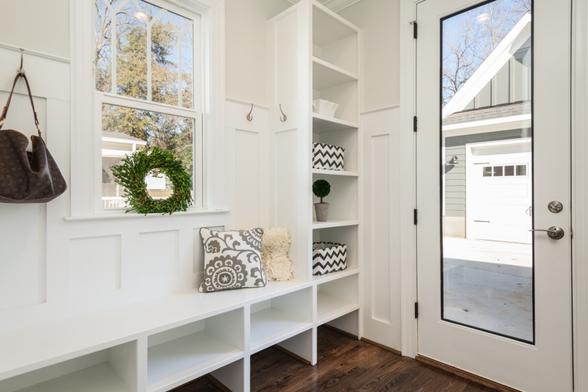 white entry way with glass door