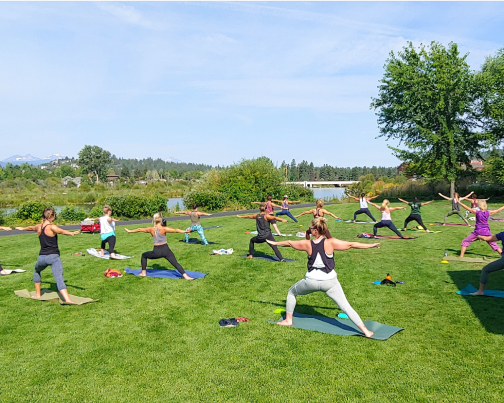 people doing yoga outside
